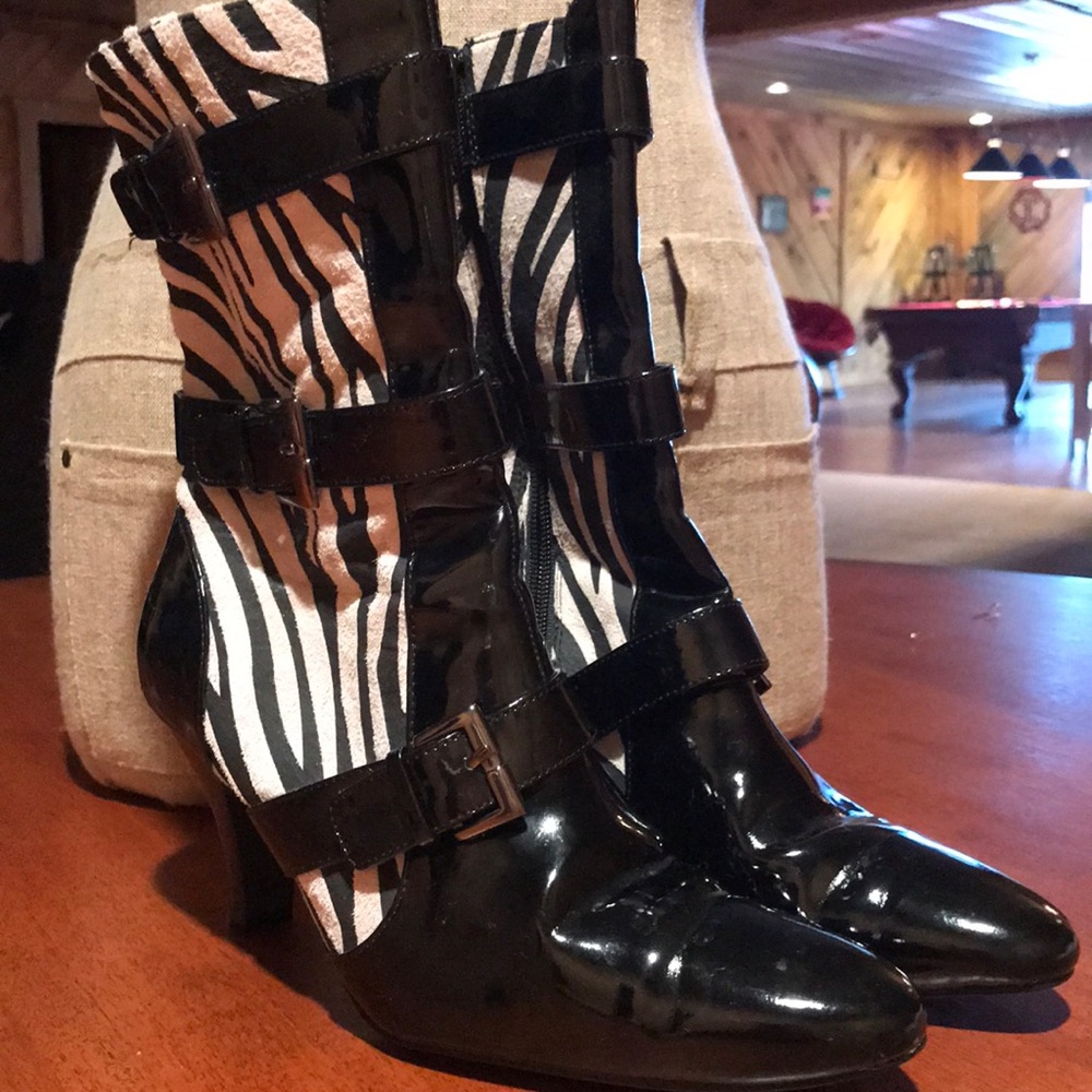 Black patent leather boot with zebra print